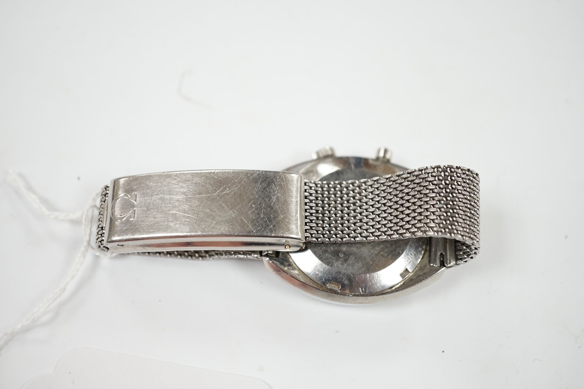 A gentleman's 1970's? stainless steel Omega Chronostop manual wind wrist watch, on a steel Omega mesh link bracelet.